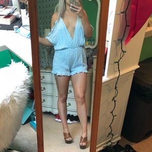 Baby blue ruffle trim plunge romper